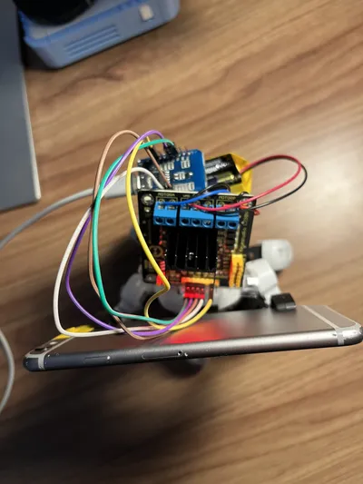 Overhead view of the robot with the ESP8266 and motor driver mounted on top.
