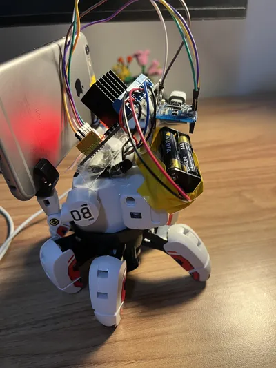 Side view of the robot with the battery compartment taped to its back.